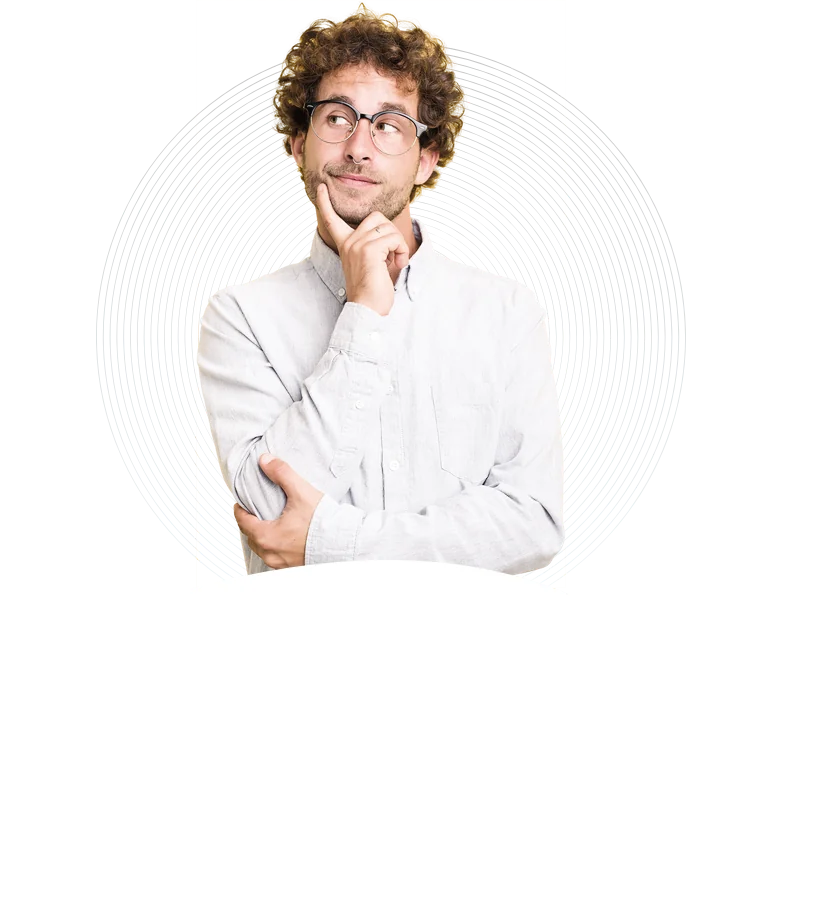 Thoughtful young man in glasses and a white shirt