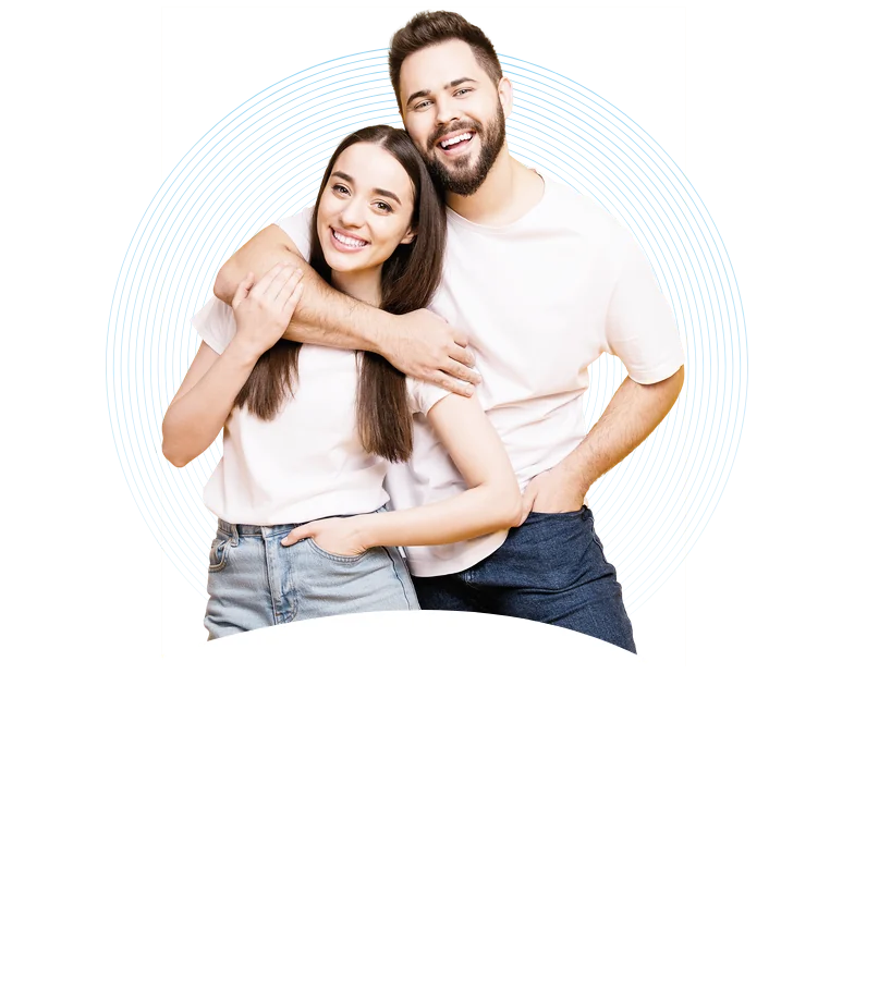 Smiling young couple embracing